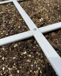 square_foot_gardening_grid_closeup_with_the_screw